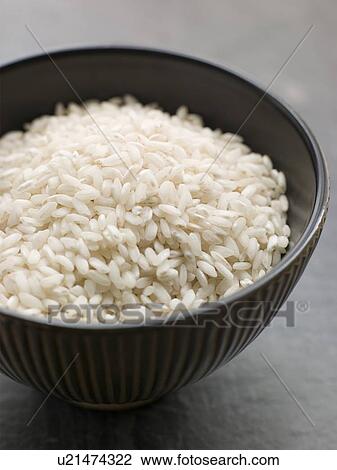 Bowl of uncooked Basmati Rice View Large Photo Image Stock Image - Bowl of uncooked Basmati Rice. Fotosearch
