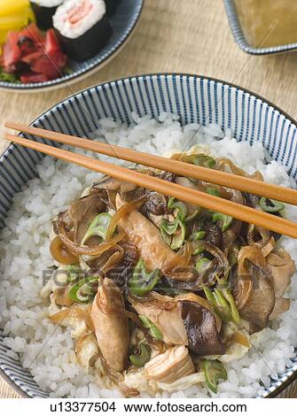 Chicken and Egg on Rice with Pickles and Sushi View Large Photo Image Picture - Chicken and Egg on Rice with Pickles and Sushi. Fotosearch