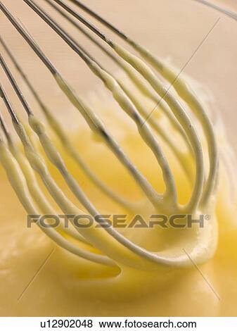 Hollandaise Sauce being whisked View Large Photo Image Stock Photo - Hollandaise Sauce being whisked. Fotosearch