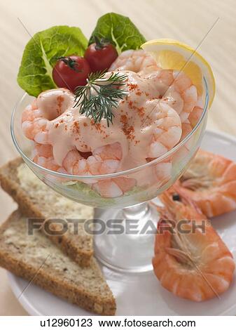 Prawn Cocktail in a glass with Brown Bread View Large Photo Image Stock Image - Prawn Cocktail in a glass with Brown Bread. Fotosearch
