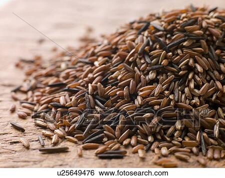 Stock Photograph - Red camargue and wild rice. Fotosearch