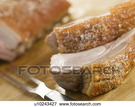 Roast Loin of Pork with Crispy Crackling View Large Photo Image Stock Photo - Roast Loin of Pork with Crispy Crackling. Fotosearch