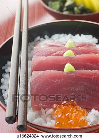 Picture - Sashimi of Yellow Fin Tuna on Rice with Salmon Roe Pickles and Wasabi. Fotosearch