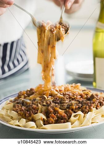 Tagaliatelle with Ragu Sauce View Large Photo Image Stock Image - Tagaliatelle with Ragu Sauce. Fotosearch