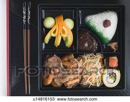 Stock Image - Teppanyaki Lunchbox with Chopsticks. Fotosearch