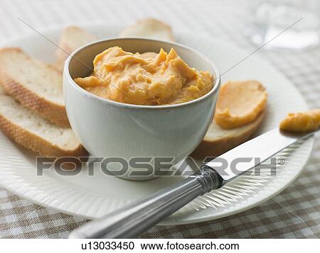 Bowl of Rouille with Croutes View Large Photo Image Stock Image - Bowl of Rouille with Croutes. Fotosearch