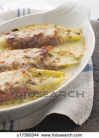 Dish of Chicory Gratin with Bacon View Large Photo Image Picture - Dish of Chicory Gratin with Bacon. Fotosearch