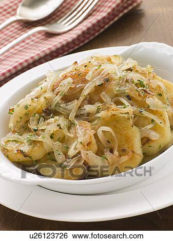 Dish of Lyonnaise Potatoes View Large Photo Image Stock Photograph - Dish of Lyonnaise Potatoes. Fotosearch