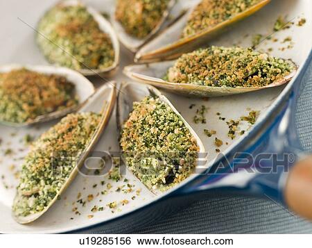 Stock Photograph - Green Lip Mussel with a Provencale Herb Crust. Fotosearch
