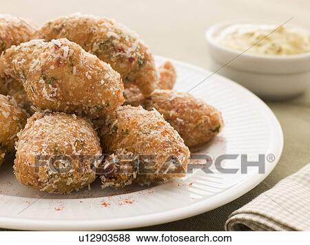 Ham and Cheese Beignets with Dijonnaise View Large Photo Image Stock Photo - Ham and Cheese Beignets with Dijonnaise. Fotosearch