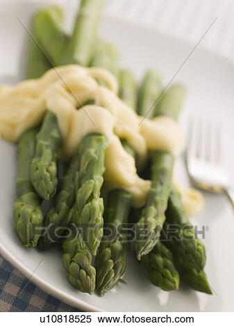 Stock Photography - Hot Asparagus Hollandaise. Fotosearch