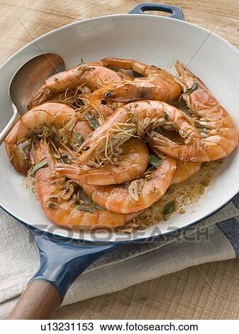 Mediterranean Prawns cooked in Pastis View Large Photo Image Stock Image - Mediterranean Prawns cooked in Pastis. Fotosearch