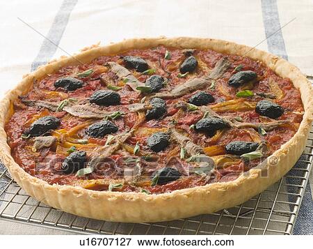 Provencale Tart on a Cooling Rack View Large Photo Image Stock Photo - Provencale Tart on a Cooling Rack. Fotosearch