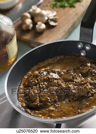 Stock Image - Steak Diane in a Saut pan. Fotosearch