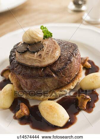 Picture - Tournedos Rossini with Cocotte Potatoes. Fotosearch