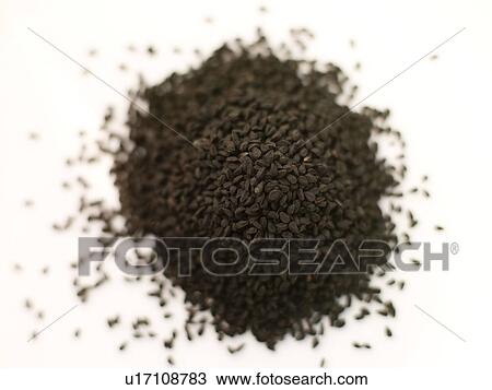 Stock Image - Black onion seeds. Fotosearch
