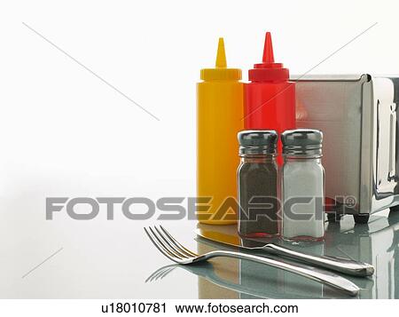 Stock Image - Diner Table with Sweet Condiments. Fotosearch