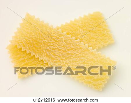 Dried pasta strips View Large Photo Image Stock Photograph - Dried pasta strips. Fotosearch
