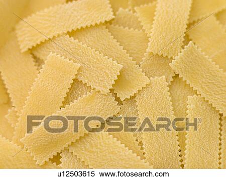 Stock Photography - Dried pasta strips. Fotosearch