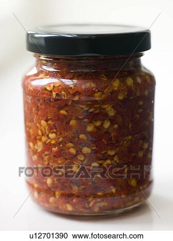 Jar of crushed chillies View Large Photo Image Stock Image - Jar of crushed chillies. Fotosearch