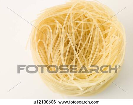 Pasta, vermicelli nests View Large Photo Image Stock Photograph - Pasta, vermicelli nests. Fotosearch