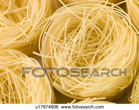 Stock Photograph - Pasta, vermicelli nests. Fotosearch