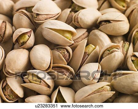 Pistachio nuts in shells View Large Photo Image Stock Image - Pistachio nuts in shells. Fotosearch