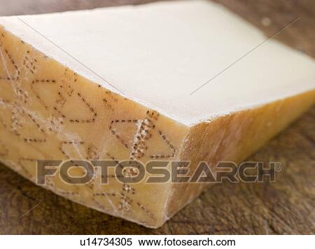 Wedge of Parmesan Cheese View Large Photo Image Stock Photography - Wedge of Parmesan Cheese. Fotosearch