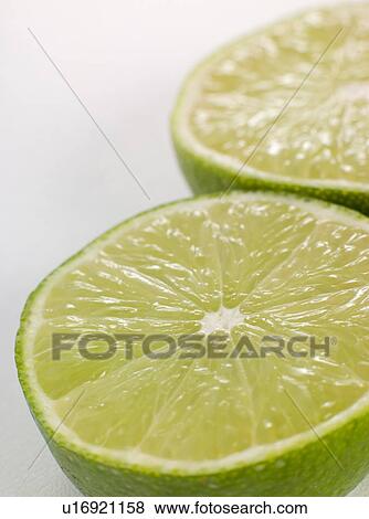 Stock Photo - Halved fresh lime. Fotosearch