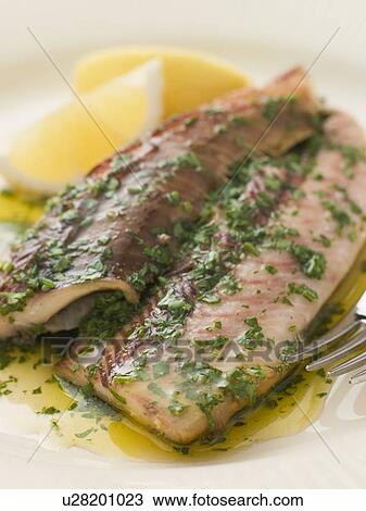 Loch Fyne Kippers Grilled with Parsley Butter View Large Photo Image Stock Image - Loch Fyne Kippers Grilled with Parsley Butter. Fotosearch