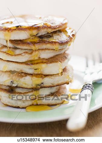 Pancakes with maple syrup View Large Photo Image Picture - Pancakes with maple syrup. Fotosearch
