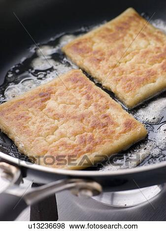 Potato Farls Frying in Butter View Large Photo Image Stock Photo - Potato Farls Frying in Butter. Fotosearch