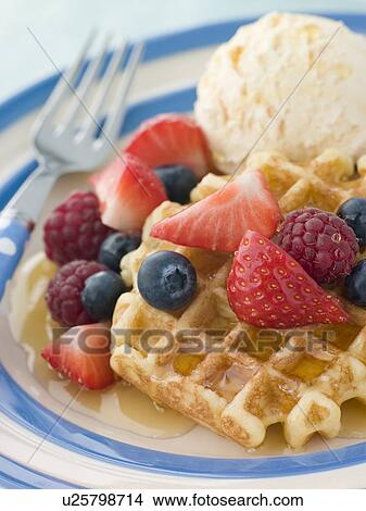 Sweet Waffles with Berries Ice Cream and Syrup View Large Photo Image Picture - Sweet Waffles with Berries Ice Cream and Syrup. Fotosearch