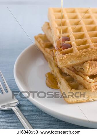 Stock Image - Waffles with Caramel Syrup. Fotosearch