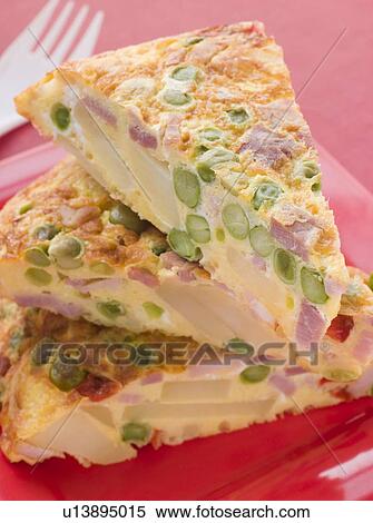 Stock Photography - Wedges of Spanish Omelette. Fotosearch