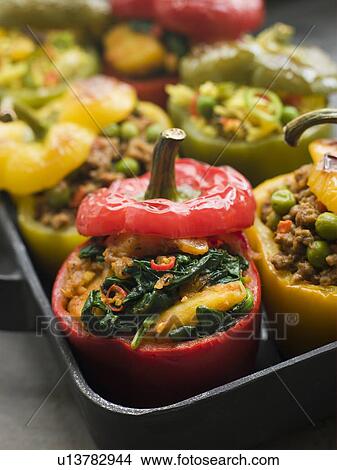 Bell Peppers stuffed with Keema Sag Aloo and Vegetable Pilau View Large Photo Image Picture - Bell Peppers stuffed with Keema Sag Aloo and Vegetable Pilau. Fotosearch
