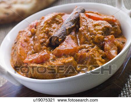 Stock Image - Chicken Rogan Josh Gosht Restaurant Style. Fotosearch