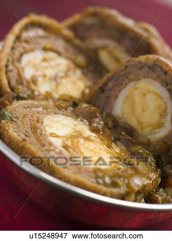 Stock Photo - Dish of Nargisi Kofta Eggs. Fotosearch