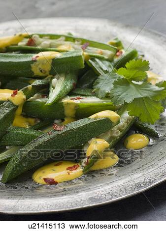 Fried Okra with Yoghurt and Coriander Curry View Large Photo Image Stock Image - Fried Okra with Yoghurt and Coriander Curry. Fotosearch