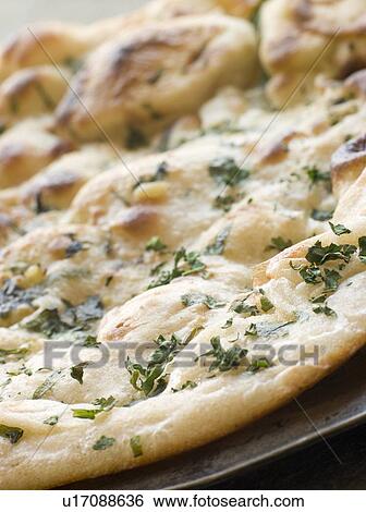 Garlic and Coriander Naan Bread View Large Photo Image Stock Photograph - Garlic and Coriander Naan Bread. Fotosearch
