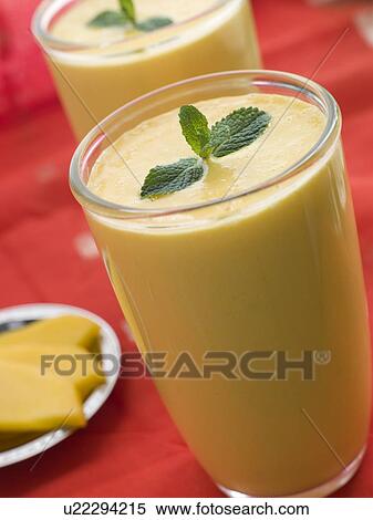 Stock Photography - Glasses of Mango Lassi. Fotosearch