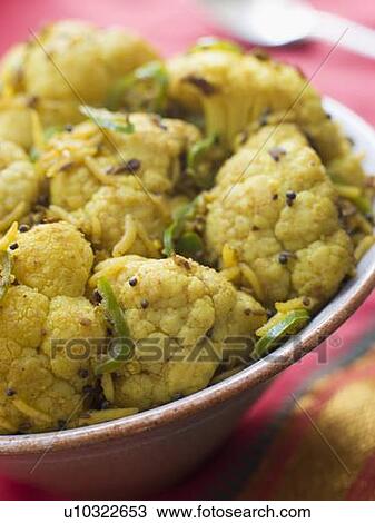 Stock Image - Green Chilli Fried Cauliflower. Fotosearch