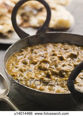Kali Dahl Served in a Karahi With Naan Bread View Large Photo Image Stock Photograph - Kali Dahl Served in a Karahi With Naan Bread. Fotosearch