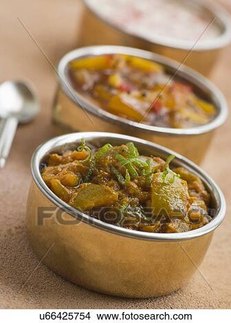 Picture - Lime Pickle with Mango Chutney and Raita. Fotosearch