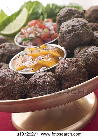 Platter of Kofta Balls with Mango Chutney and Tomato Relish View Large Photo Image Stock Photo - Platter of Kofta Balls with Mango Chutney and Tomato Relish. Fotosearch