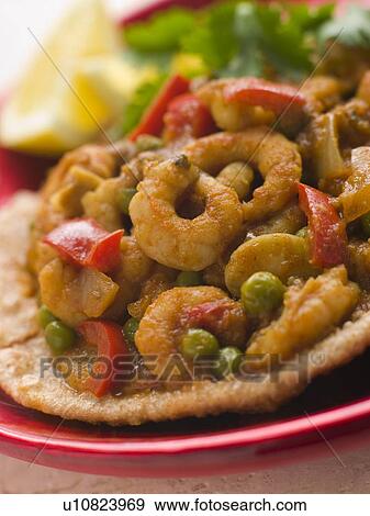 Stock Photo - Prawn Puri with Lemon. Fotosearch