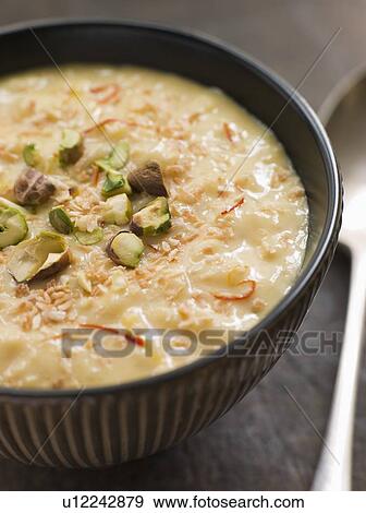 Saffron Pistachio and Coconut Rice Pudding View Large Photo Image Stock Photo - Saffron Pistachio and Coconut Rice Pudding. Fotosearch