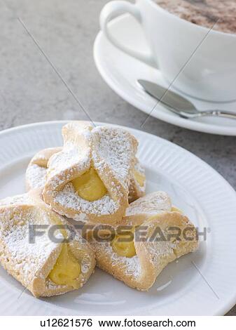 Bauletti Lemon Biscuits with a Cappucino View Large Photo Image Stock Photograph - Bauletti Lemon Biscuits with a Cappucino. Fotosearch