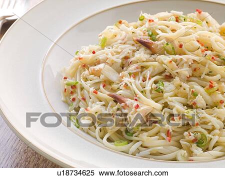 Stock Photography - Bowl of Crab Linguini with Chilli and Coriander. Fotosearch