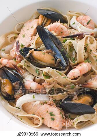 Bowl of Seafood Tagliatelle View Large Photo Image Stock Photograph - Bowl of Seafood Tagliatelle. Fotosearch